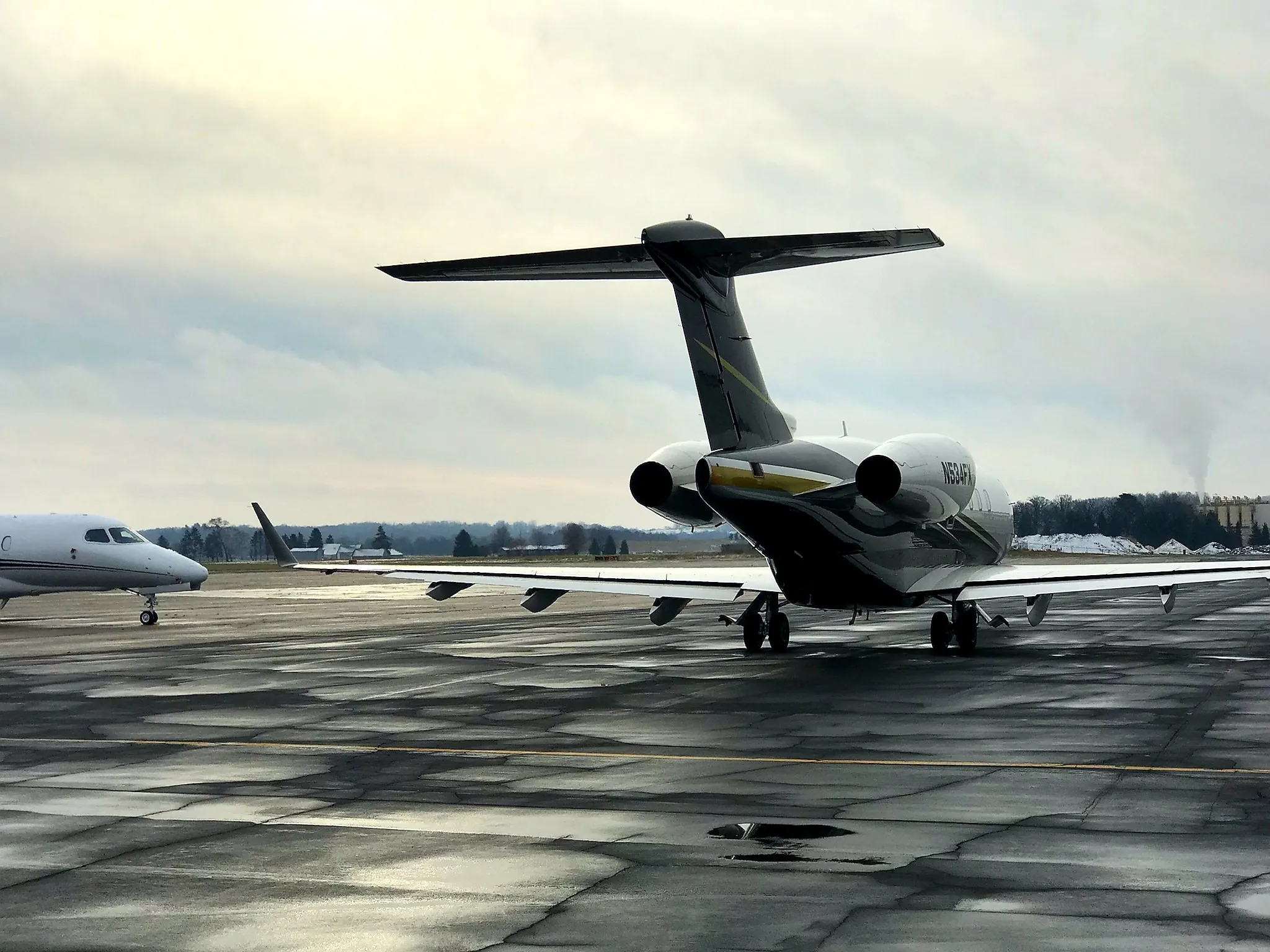 Jet parked by fuel station